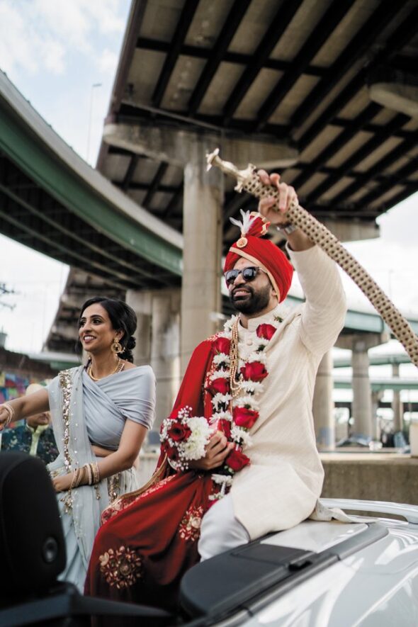 Here Comes the Groom: As part of the Bharath groom procession, Manish arrived at the ceremony riding in a convertible with his sister. “We played music and danced and had a good time,” he says.